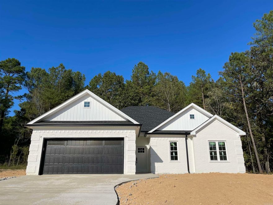 New Construction in Fountain Lake School District. Three bedrooms and Two bathrooms on approximately 1 acre lot. This home features quartz countertops and luxury vinyl flooring. Open floor plan with eat in kitchen and island for bar stools. Crown molding, stainless steel appliances and custom touches throughout.  Beautiful, modern colors were selected for this home. (Alabaster walls, High Reflective White cabinets/trim,Tricorn Black island.) The new bypass gives quick easy access to everything. (Annual taxes were for lot only.) Estimated completion first week in November.   Welcome Home!