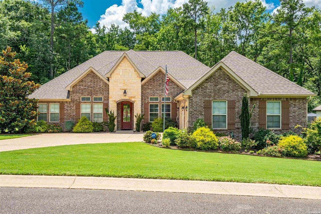 Welcome to your dream home nestled in the picturesque Glencairn neighborhood of Hot Springs, Arkansas! This impeccable 4-bedroom, 2.5-bath house offers a perfect blend of tranquility and convenience. Step inside and be greeted by a modern kitchen adorned with high end finishes. The sleek design and abundant storage space make this kitchen a chef's delight with a gas cooktop and large island with breakfast bar. Adjacent to the kitchen, the inviting living room features stunning wood ceilings and a cozy gas fireplace, setting the perfect atmosphere for relaxation and gatherings. There is a formal dining room for larger gatherings or a eat in kitchen. The split bedroom layout provides privacy for owner and guests alike. The fourth bedroom is currently being used as a home office. This home has ample storage throughout including indoor floored attic access. This could be finished out and made into more living space as well. Venture outdoors to discover your own private oasis with a covered patio. Whether you're hosting summer barbecues or enjoying a tranquil morning coffee, this outdoor space is ideal for all your entertaining needs. Spacious garage offers ample room for your vehicles