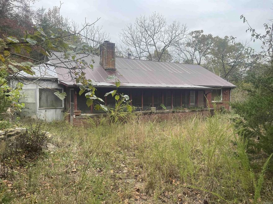 Tucked away in the Ozark foothills, this 38.33-acre m/l property is a haven for outdoor enthusiasts. The existing home needs work but could be transformed into a cozy hunting cabin or weekend getaway. Towering hardwoods, abundant wildlife, and a large barn make this an ideal basecamp for deer season or ATV adventures. Whether you're looking for a private retreat or a place to unplug and explore, this land delivers the ultimate backwoods experience.