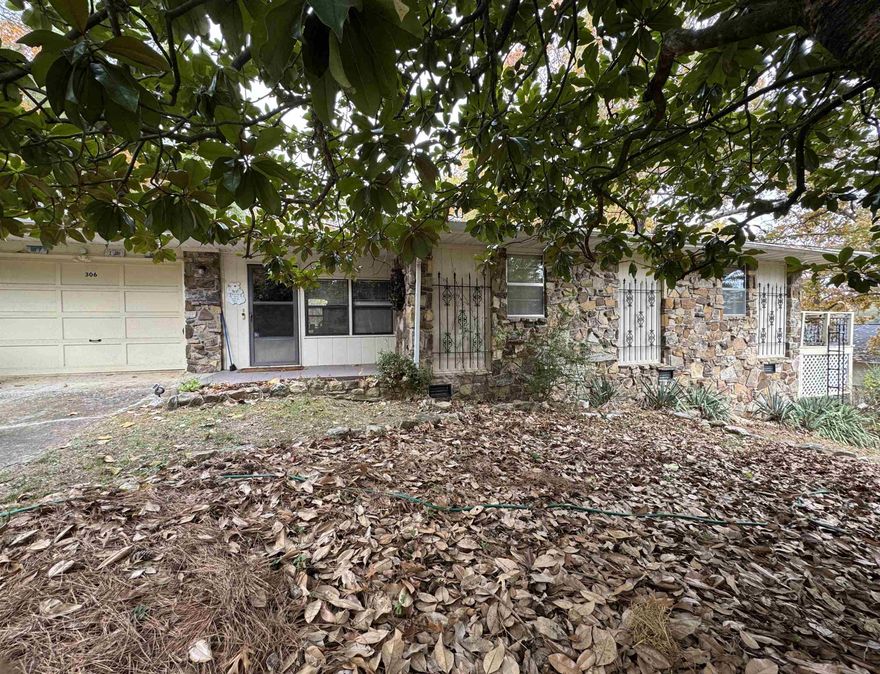 Seasonal Lakeview Charm with Flexible Living Space! Welcome home to this charming 2 bed/2 bath residence, perfectly situated in a great location near beautiful Crown Lake. This home offers a blend of cozy comfort and incredible versatility, featuring multiple bonus areas that adapt to your lifestyle-whether you need a dedicated office, a formal dining space, or even a third bedroom. Imagine enjoying your morning coffee on the spacious back deck, taking in the seasonal lakeview. The heart of the home features an inviting open kitchen and living room layout, perfect for entertaining or relaxing. The living room is anchored by a traditional wood-burning fireplace with an insert, ensuring warm, cozy evenings all season long. The main level includes 2 nice sized bedrooms and 2 full baths. One of the properties best feature is it's flexible layout. The garage has been converted into a workshop. The enclosed breezeway now serves as a bonus room, currently used as a dining area, with an electric fireplace and a built in desk area. Adjacent is a 2nd bonus room being used as a 3rd bedroom. A partial basement serves as a reliable storm shelter. This turnkey home includes all appliances!