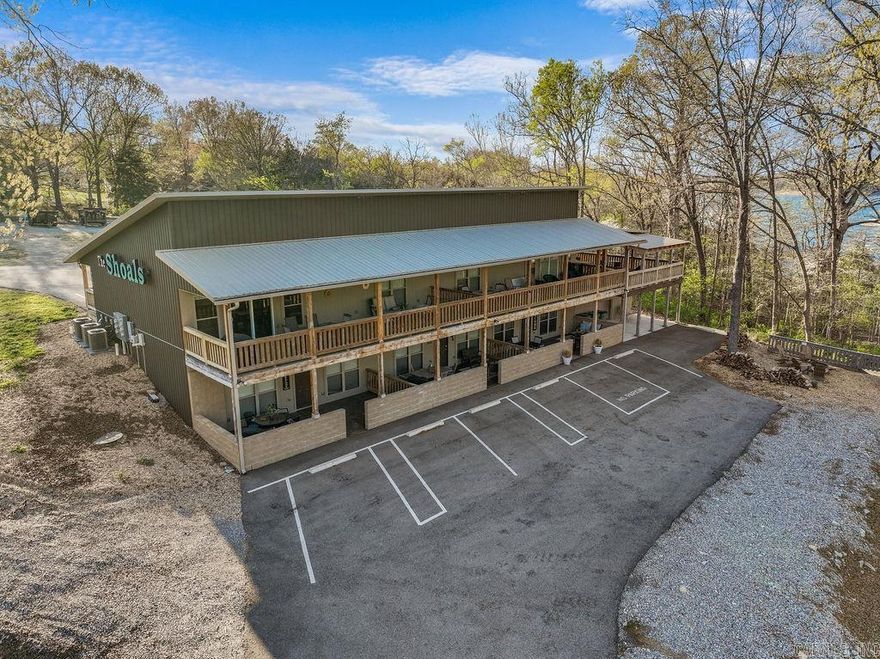 Investors, take note—this fully furnished, all-electric 1-bed, 1-bath unit in The Shoals condo community is a prime opportunity for a vacation rental near beautiful Bull Shoals Lake. With 906 sq ft of open, low-maintenance living space, this condo offers a seasonal lake view and is just minutes from the marina and the world-famous White River, making it a hot spot for tourists, anglers, and lake lovers alike. The welcoming layout, peaceful setting, and close proximity to dining, hiking, and water recreation make it an easy choice for short-term renters. Whether you’re building your rental portfolio or seeking a weekend escape with income potential, this one is ready to go.