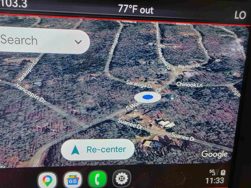 Wonderful hillside lot with a wet weather creek on one side. Lots of trees and close to the North golf course.