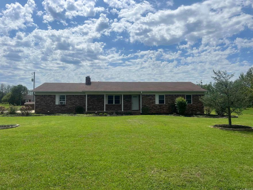 Spacious 4 bedroom, 2 bathroom brick house with a safe room/shelter, game room/great room, tons of kitchen storage, and a HUGE covered back porch. New flooring, paint, roof, and central HVAC unit too! Over an acre to enjoy and several more surrounding. This country oasis is only minutes from the interstate and is the perfect home for both relaxing and entertaining. Lawn care is provided! No pets allowed.