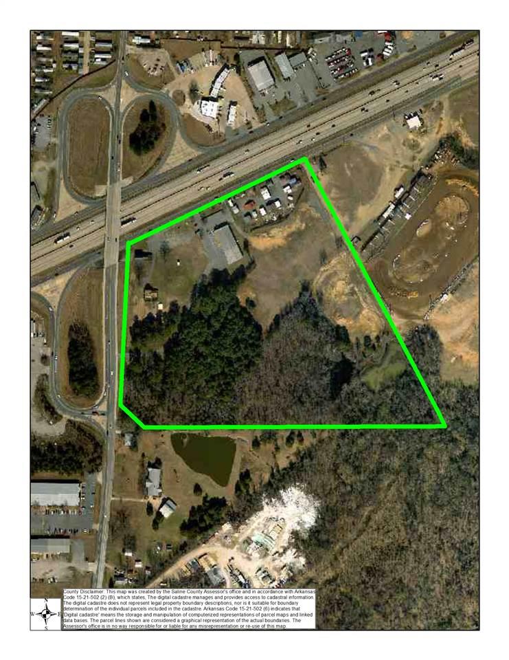 Great investment land or ready for retail! 28 acres on I-30!! Plus this land already has some buildings on it that could bring in future income including a 11,200sqft building. call for more details!! survey online for reference purposes only. 2 homes on property convey at no value