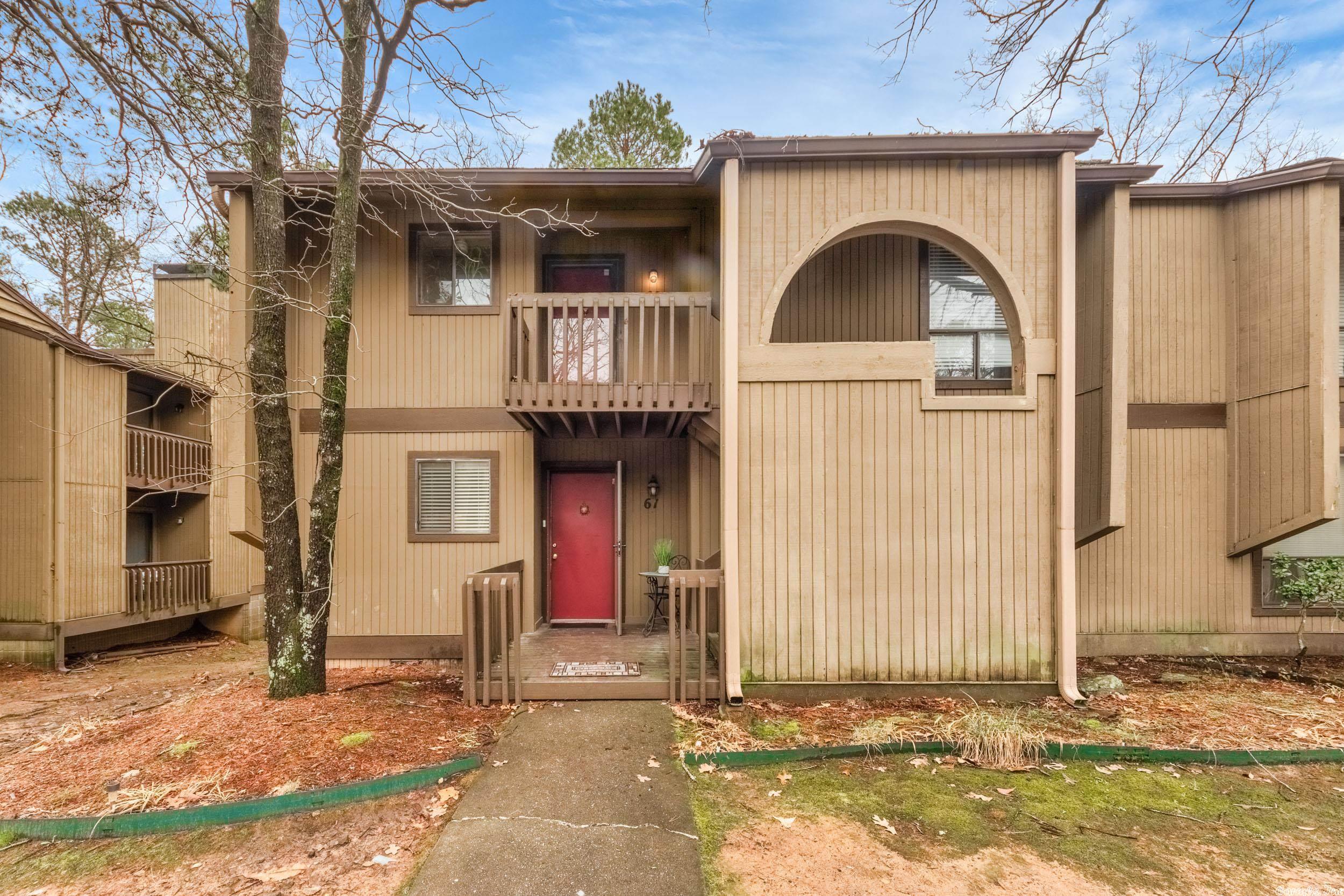 Pull right up to the front door of this lovely two bedroom, two bath lower level Condo in West Little Rock. Snuggle up in front of the woodburning fireplace fireplace or enjoy the outdoors while you sip coffee on either of the covered decks. Nice outside storage area. NEW vinyl plank floors in main living space, NEW Carpet in Bedrooms, FRESH PAINT throughout. Well-located: close to shopping, restaurants, interstates & hospitals. Great condo unit for homeowner or investor.