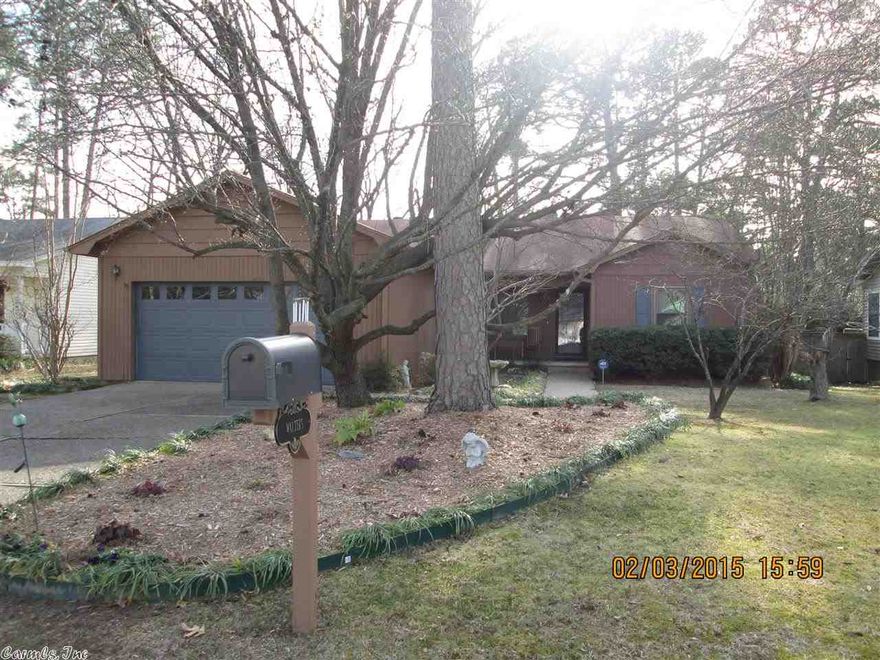 IMMACULATE, clean as a pin, ONE-LEVEL home in convenient location.  4 large BR's  w/split BR foorplan-- one of the BR's also has private entrance from garage. Den w/wood-burning fireplace, very open to large dining and eat-in kitchen. Laundry w/new washer/dryer!  New deck & french drains.  Beautiful landscaping w/mature trees/plants!   Freezer in garage & frig stays! Fold-out windows for easy cleaning. Security system w/remote.  Great for mother-in-law quarters or teens!  Shows well!