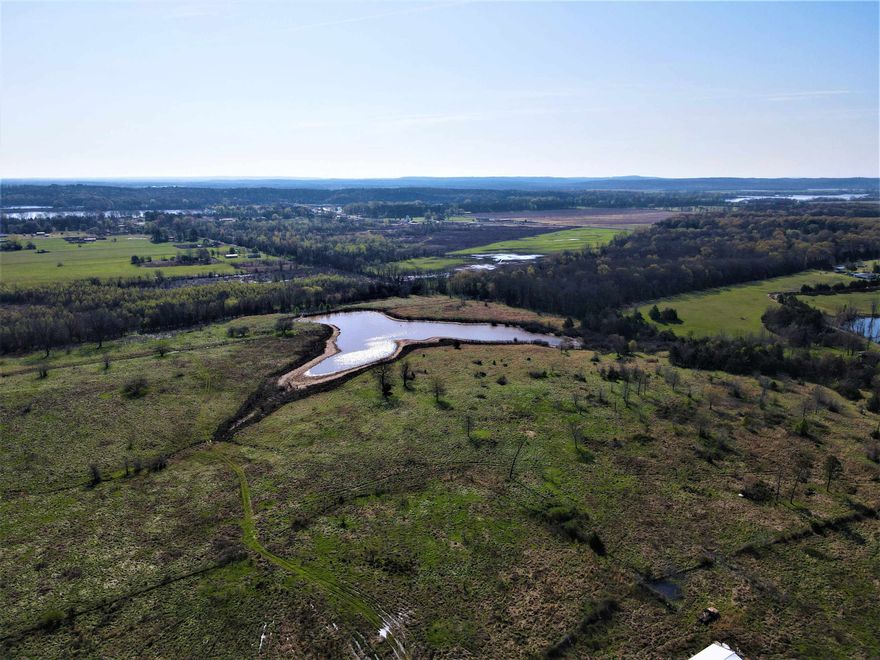 - 75 +/- acres - 5.9-acre pond - Approximately 45 acres of open pasture - Good waterfowl, dove and deer hunting - Numerous build sites - Full perimeter fence with some cross fencing - Pole barn and cattle chute  - Utilities on or near the property  - 4 miles to Conway - 30 miles to Little Rock Metro