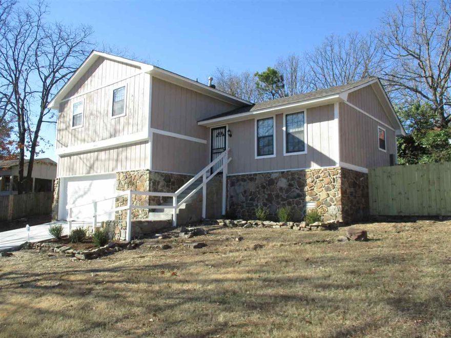 $250 OFF FIRST MONTHS RENT!!!  This beautiful 4bd-2.5ba-2ga home in Maumelle has been completely renovated! The home has new paint on the interior-exterior and updated landscaping providing a welcoming curb-appeal.  Your new home features gorgeous wood vinyl flooring throughout the main areas and plush new carpet in the bedrooms. We have updated the AC system and water heater to insure you are comfortable in the heat of the summer and provide efficiency.