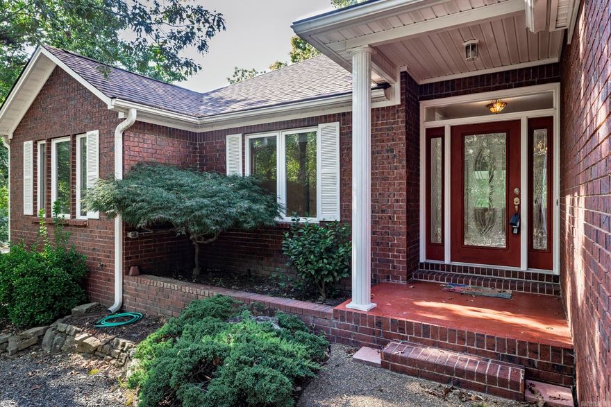 Oh, the possibilities! Enjoy this spacious home on the 14th green/15th tee of the Balboa golf course! Take in the view from the "Arkansas Room" with its removable window panels or take a dip, in the hot tub on the back deck. Below the deck is another space with loads of windows, making it a great studio or workshop. Around the corner is golf a cart garage (or maybe a "She-Shed"). Inside you'll find an ample, open floor plan with beautiful hardwood floors and recent interior paint. There is a  pantry, and cabinets with pull-out shelves for easy access in the kitchen.  The garage has a typical door as well as a pull-down screen for when you want to enjoy the tiered garden and the sounds of nature. Architectural Shingles 11/2024