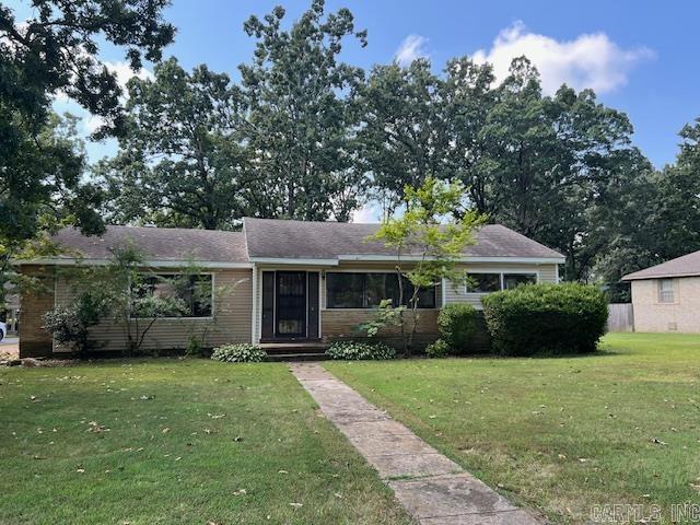 Corner lot with a side load carport. This ranch style home offers three bedrooms two bathrooms and two living areas. This canvas allows a place to make it your own. The interior has over 1500 square feet of living space.