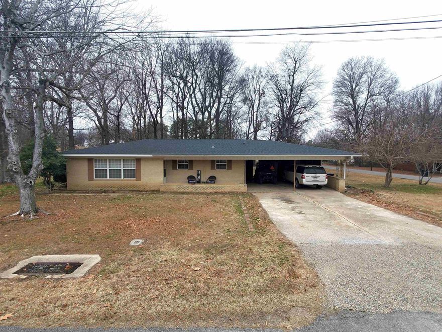 This cozy midcentury ranch style home located at 517 Crestline Dr. is nestled on a 162 ft x 149 ft (.54 acres) corner lot, covered with majestic shade trees. This well-maintained property features an open floor plan with 2 bedrooms, 2 full baths, a bonus room and a spacious backyard perfect for entertaining. Fresh paint, flooring, new roof, new central heat and air, and newer energy efficient windows make this charming home move in ready! The attached double carport is big enough for 2 large SUVs, with ample storage left over. The property also has a 18 ft x 24 ft metal carport on a concrete slab, perfect for storing all your toys! Picture perfect homes like this are hard to come by in Piggott AR. Priced at $149,900 this serene corner property won't last long!