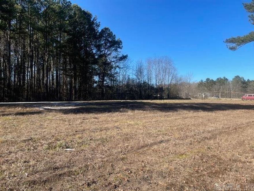 Come check out this great opportunity for a rental property or perfect 1 acre lot to build a home or a commercial shop. Completely fence in with 6ft chain link!!Located in the Landmark Community. The property shares a driveway with Landmark Pentecostal Church.  The Price Is Right!!!