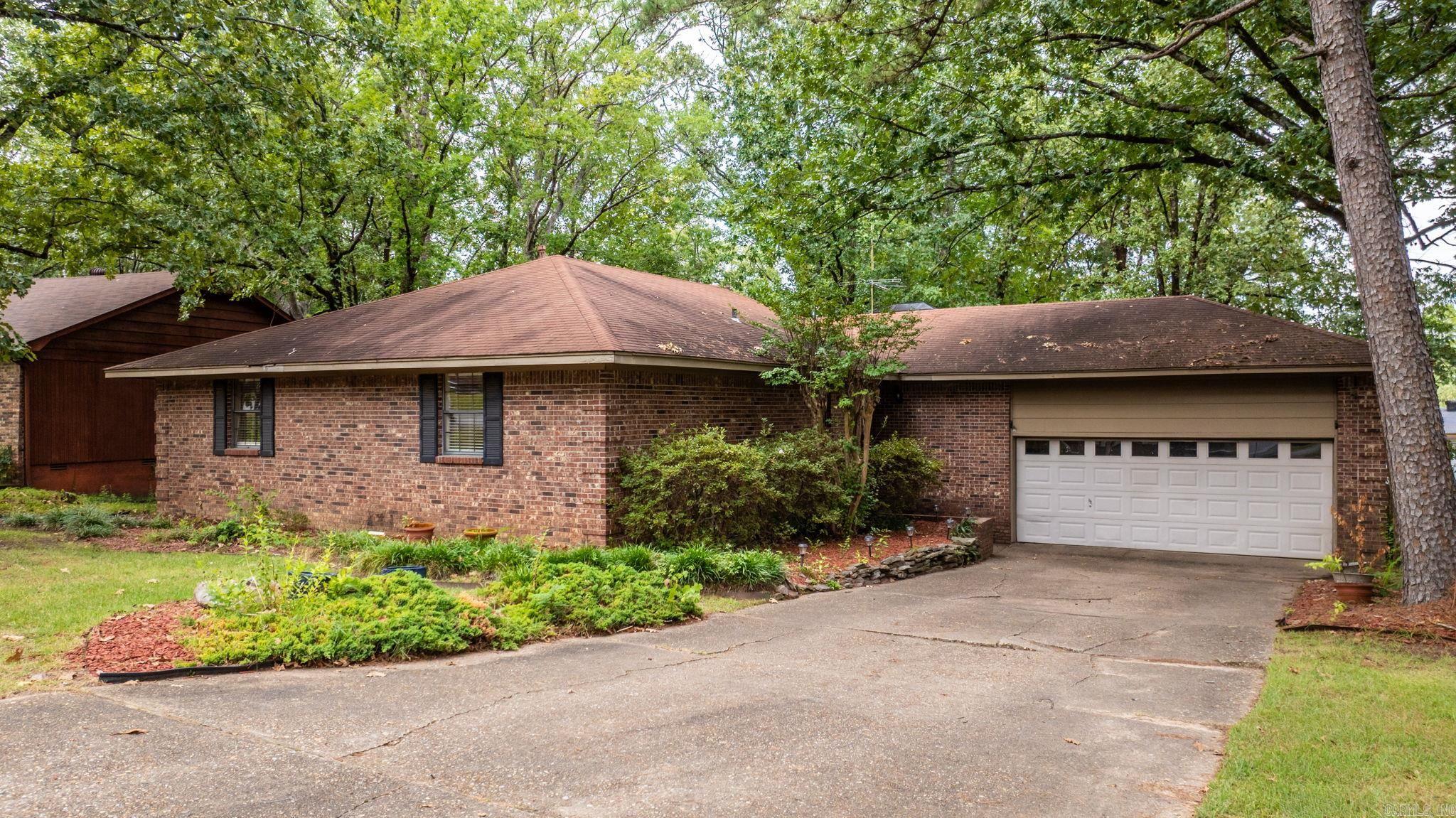 Pretty one level home tucked away in Marlowe Manor with nice updates. Kitchen remodeled with painted white cabinets, Corian countertops, stainless appliances and tile floor. Laminate flooring in main living areas and one bedroom. Wonderful new primary bath with new tub/shower with rain showerhead and new vanity with Corian countertops. Spacious great room with laminate flooring and wood burning fireplace with gas logs. Two additional bedrooms with good closet space. Full bath with tub/shower is nice and neutral. Lovely back yard with wonderful deck. Enjoy the neighborhood park and pool. Fantastic home. New HVAC 2024. New deck 2024. Seller will pay $2500 towards buyer's closing costs and pre-paids with acceptable offer. Agents see remarks. Come see today!