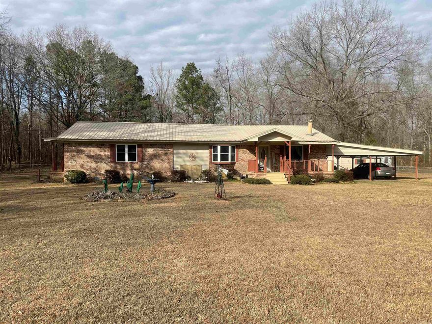 Please come check out the beautiful home just minutes from I-530/White Hall Exit. Located in a quiet neighborhood off Claude Rd. This mobile home was remodeled  and doubled in size into a traditional house years ago. Completely fenced in with a 1.5 acre yard. 2 Storage Buildings, Generac Generator, Covered Back Porch!! Property could possibly be financed FHA or VA.