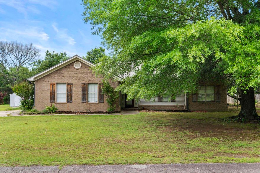 Space for you, space for the kiddos, space for your dogs or a horse!!!!  This 4 bdrm 3 full bath house sits on an acre just outside Searcy and seller tells me this is a wonderful neighborhood.  House is all electric, the garage has been transformed into a 4th bdrm that was used  as an "in-laws" suite with a walk in shower in the bathroom. . New commercial grade tile floors when the house was remodeled in 2018, kitchen updated with a farm sink and subway tile and quartz countertops and stainless appliances. This home is spacious and inviting.  There is a cozy office space with a reading nook/sunroom on the back of the house which opens to a large deck and backyard that includes flower/garden beds, apple trees and a premier basketball court.  There are two BEB storage buildings,   so, there is lots of storage inside and out!  Lots of possibilities with this property!  Call for your showing!