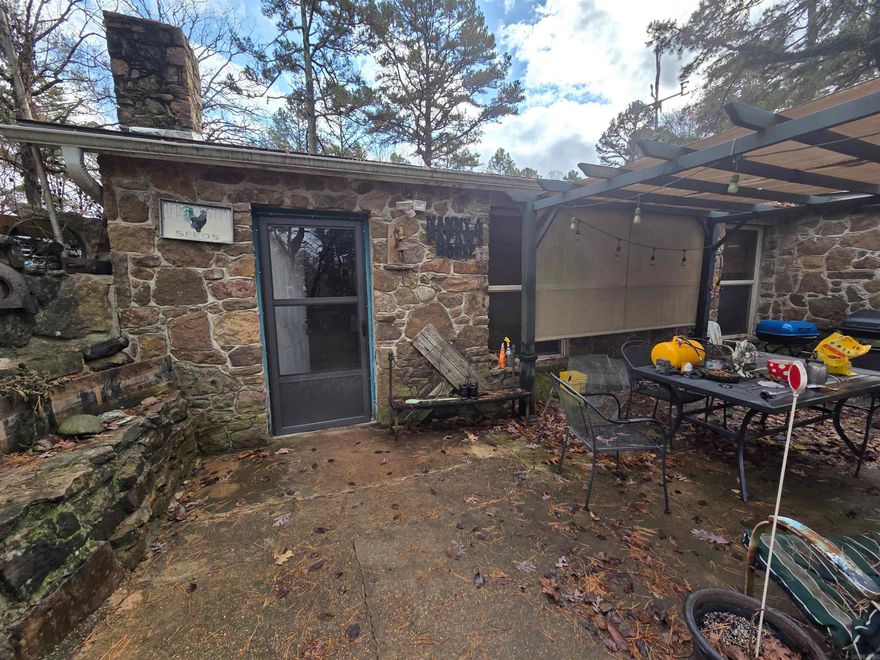 If you like underground homes, here's just the one for you. 3 bd, 2 bath home with a western feel. The bedrooms are large, 1 is a master suite with a large walk in closet. There is a laundry room.  A roomy 2.75 acres for you to have a garden, and chickens for the chicken coop and a dog pen. The back yard has a 5 ft fence around it with 2 gates. There are 2 small older 8x10 outbuildings  and a 18x20 closed in carport with a concrete floor and another 18x20 building with power. Plenty of space to store your tools and toys and a large front yard for the kids to play in.