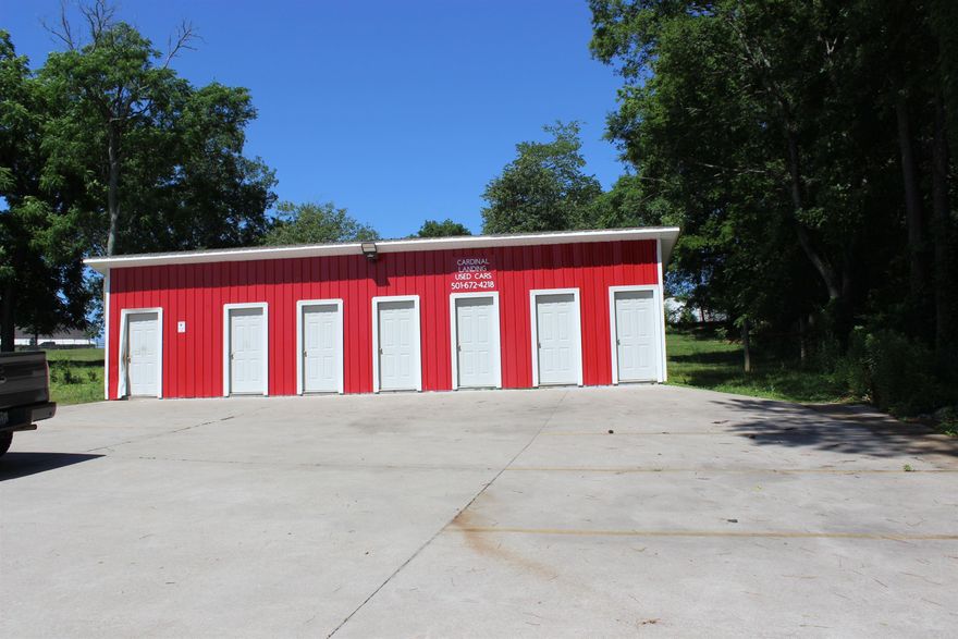 Commercial property in the heart of Haskell. Currently is a food truck court. Has all public utilities with 6 storage units and a public bathroom for customers. Pavilion for events and is in a great location.