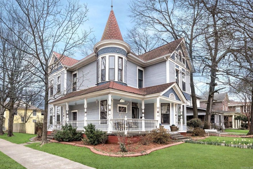 Exceptional Historic Residence in the Heart of Little Rock. Discover timeless character and generous space in this stunning Traditional-style home at 1403 S Center Street. Built in 1896, this remarkable 2-story residence offers approximately 2,944 square feet of living space, blending historic charm with everyday comfort. Featuring 5 bedrooms and 2 full baths, this home provides ample room for family, guests, or flexible living arrangements. Inside, spacious living areas showcase beautiful wood and tile flooring, tall ceilings, and abundant natural light. The decorative fireplaces add classic appeal, while central electric cooling and gas heating ensure year-round comfort. The kitchen comes equipped with a gas range, free-standing stove, dishwasher, and refrigerator that conveys. Situated on a fully fenced lot with wood fencing and public utilities, this property offers privacy and convenience just minutes from downtown amenities, dining, and entertainment. A rare opportunity to own a piece of Little Rock history with space, charm, and an unbeatable central location. Pre-Inspected Feb 2026.
