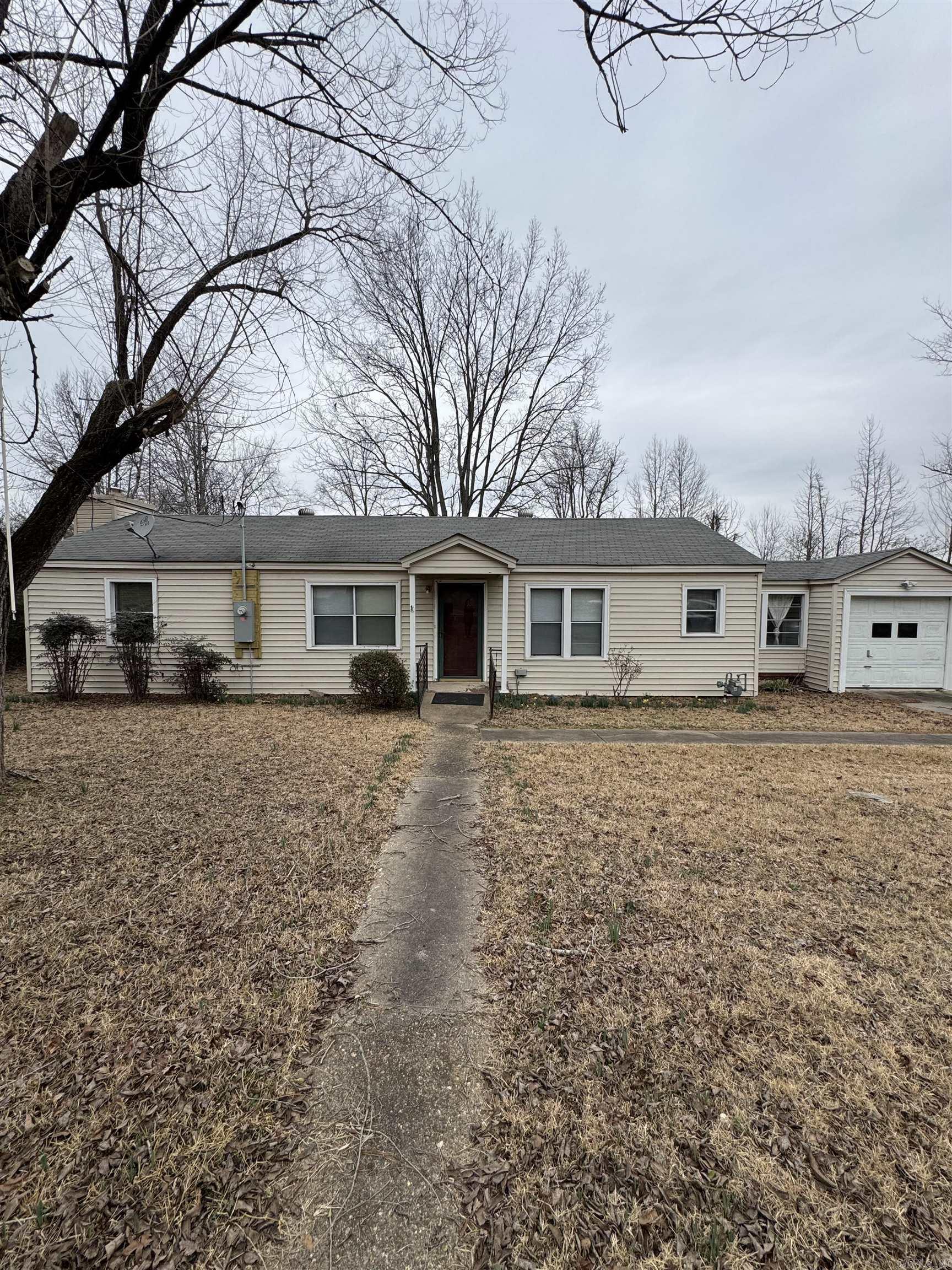 Welcome to 2706 Edison in Benton, AR! This charming 4-bedroom, 2-bathroom home offers a modern and easy-to-maintain living space with no carpet throughout. The property includes a convenient storage building for all your organizational needs, as well as a 1 car garage for parking or additional storage. Located in a desirable neighborhood, this home provides a comfortable and functional layout for your everyday living. Don't miss out on the opportunity to make 2706 Edison your new home sweet home!