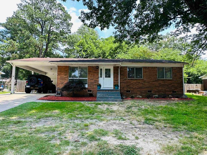 Cute updated 3 bedroom, 2 bath home.  You will love the beautiful kitchen with plenty of cabinets, formica countertops (looks like granite), glass backsplash, close soft drawers, stainless appliances, breakfast bar, and pantry. Cute updated bathrooms. Fresh paint.  Large deck on rear of home. Nice Storage Building out back.  Storm Cellar. Storage Room off Carport.  Refrigerator, washer, & dryer negotiable.  Please measure if concerns with square footage.