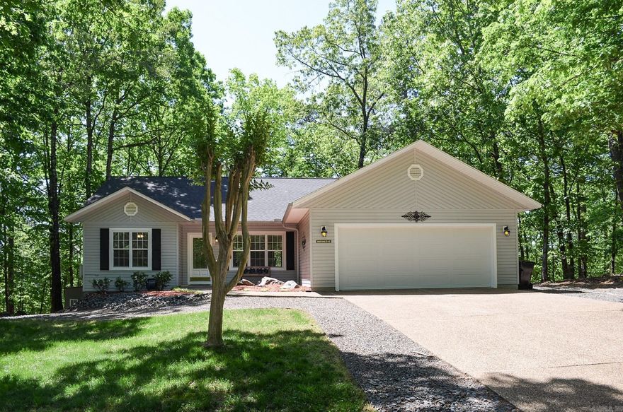 Better than new.....this 3 bedroom 2 bath home has been meticulously cared for. Upgraded granite counters, flooring, roof and gutters. Private backyard that reveals Lake Cortez in the winter months. Split bedroom floor plan with gas log fireplace. Enjoy the bonus sunroom , vaulted ceiling and engineered hard wood floors. Hot Springs Village Property Owner Association has a new member buy-in fee of $2.000.00 due and collected at closing.