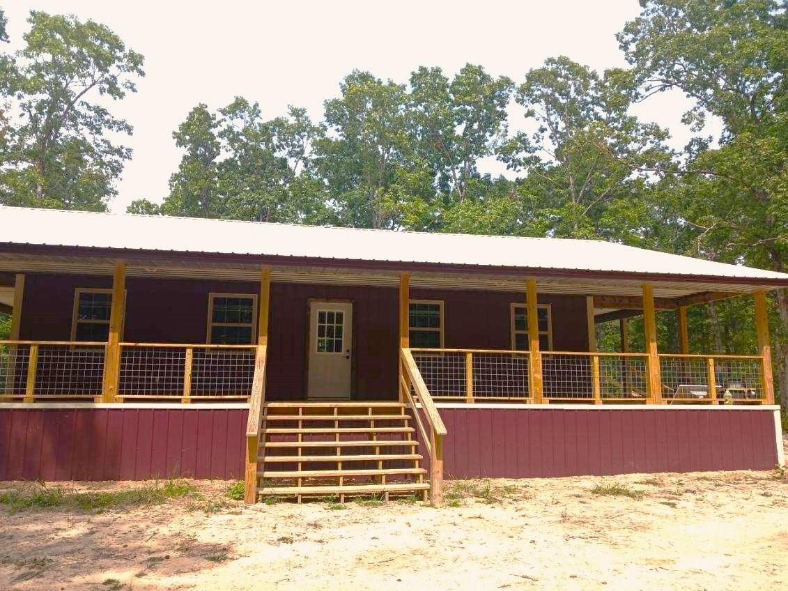 Discover this remarkable 640-acre recreational paradise nestled in the heart of the Ozark Mountains under 30 miles from Mountain View. This remote and private retreat features a custom-built 3-bedroom, 1-bath rustic ranch-style home with a wrap-around porch, perfect for enjoying the peacful serenity of marketable timber and rolling hills. The land boasts a newly improved trail system, select cut hardwoods, and an abundance of wildlife, including deer and turkey. This property showcases the natural beauty and off-grid potential. Ideal for hunting, the property features multiple ridge lines for the ultimate outdoor experience. With proximity to Mountain View and the White River for fishing, canoeing, and more, this tract offers endless recreational opportunities. This property is a hunter's dreamācall today for your private showing!
