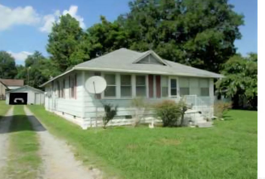 Great 3 bed 1.5 bath on large lot with a detached carport. Ready to move into.  Newly Remodeled mud room/ utility room. Roof is only 1 year old. Central heat and air is less than 5 year's old. Backup gas heaters in home. Hardwood floors though out the home.  Kitchen stove, refrigerator, washer and dryer stay with home.  Large rooms with lot's of storage, priced to sell. Nice large front porch and rear patio