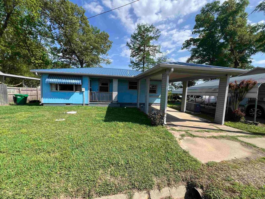 Lakefront fixer-upper with incredible potential! Prime location directly on the water with lake projected to return in 2028. Includes shop with potential for apartments or Airbnb. Great opportunity to create your own oasis or investment property. Agents see remarks