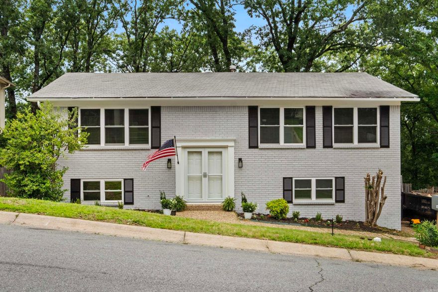 Great location!! Come tour this spacious home in the heart of West Little Rock. A lot of upgrades. Fresh paint inside and out. All exterior doors are new. New Larson storm door added. New stove. New HVAC system. New water heater. New lighting throughout. New window blinds. On the upper level this home features a spacious living area, designated dining area off the kitchen, kitchen with tons of natural light, full bath in the hallway for secondary bedrooms, and a primary bedroom with on-suite. Lower level features a large second living space with fireplace, 4th bedroom, a full bath, a spacious laundry room, and garage access.