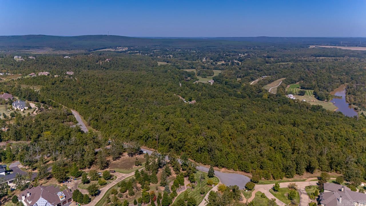 Beautiful view of Pinnacle Mountain in the luxurious Waterview Estates gated community. Sitting off Lake Maumelle you will find this private 16 acre estate located on a cul-de-sac! Community amenities such as the Lake views, tennis & basketball courts, soccer field, walking trails, bonfire and picnic area are offered with-in this highly sought after community. Minutes away from all your needs and wants, yet secluded enough to provide serene living. This tract faces the Arkansas River Valley with Lake Maumelle just across the ridge. Visit www.waterviewlittlerock.com for additional information on the community.