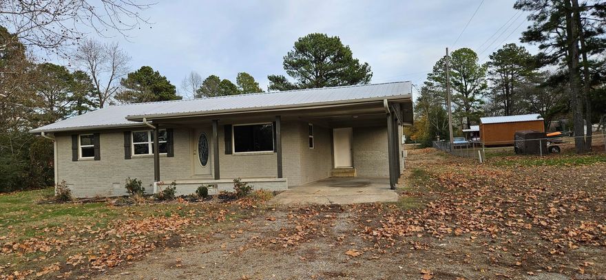 Updated 3 bedroom 2 bath home with carport on an acre just outside Searcy city limits.