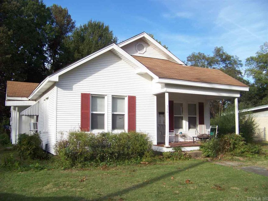 The tall ceilings and hardwood floors in this home beautifully display its historic style.  Windows and a/c unit have been replaced in the last 5 years.  Home sits on a large lot with plenty of privacy in the back yard.