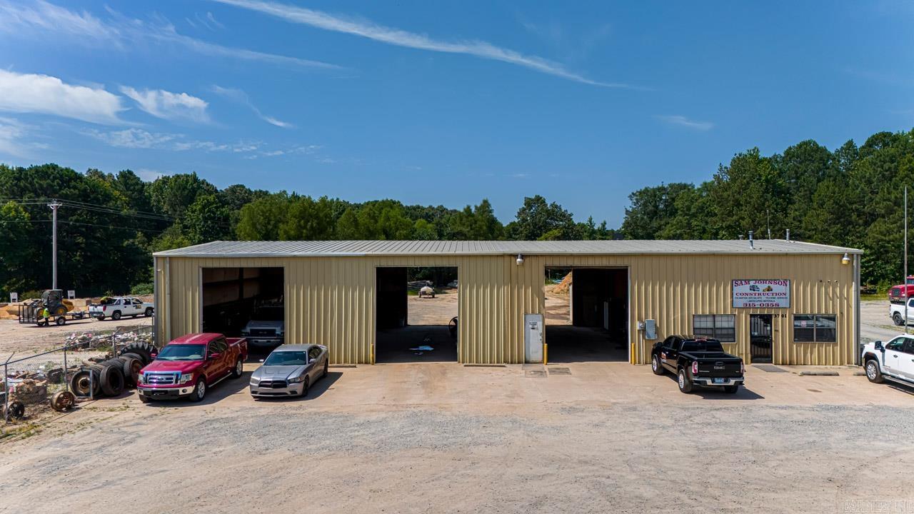 LOCATION, LOCATION, LOCATION... Great Investment Property or End User Property. Property consist of 3.81 level acres +/-, 5000 Square foot building ( with 1200 Square foot office space, 3800 square feet of warehouse / shop space ). Shop / Warehouse Space has tall doors and ceiling with Bay Garage doors located in the front and back of building. This property sits in a High Traffic, Visible Location at the corner of Alcoa Road and Benton Parkway. Possible uses will be office / warehouse space, Shop / Equipment Space, Retail, Gas/Convenient Store, etc. endless uses. The seller is just simply relocating his business to a larger area.