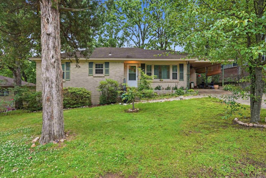 Super cute home in the historic Park Hill subdivision featuring brand-new windows and timeless character throughout. Hardwood floors lie beneath the carpet, ready to be uncovered and restored. Enjoy a quaint eat-in kitchen along with a separate formal dining room—perfect for gatherings. Laundry is conveniently located in the storage room under the carport. A wonderful opportunity to own a home with classic charm and potential!