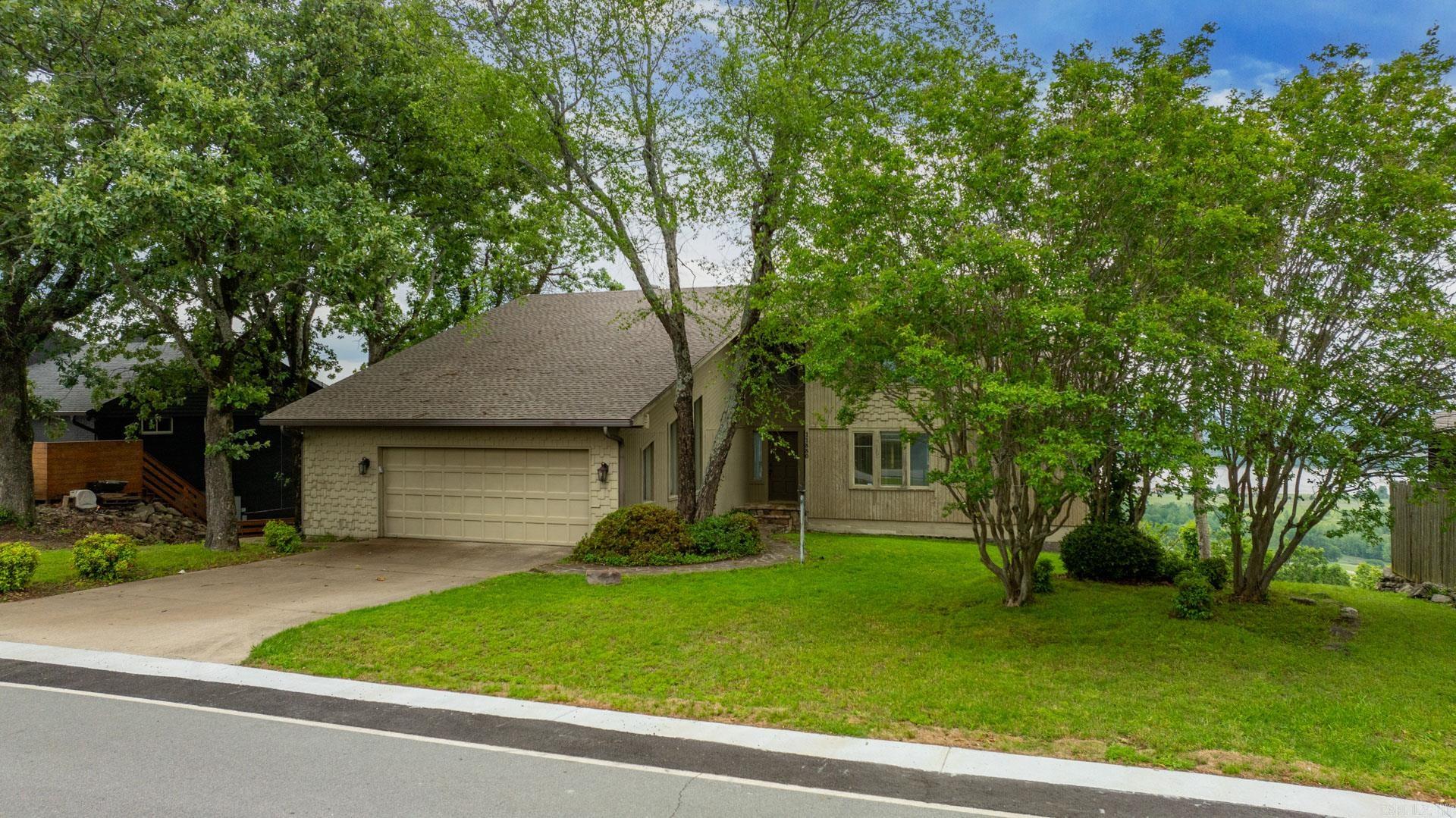 3 level house with 4 bedrooms and 3 full baths and 1 half bath. On a street that has only one way into and is thus very private. One of the best views in Little Rock overlooking the Arkansas River. Very large downstairs great room with a bedroom and bath. House requires updating and is priced accordingly. Needs a new deck. New roof installed this year. House just had energy efficiency assessment and improvements. Two car garage with lots of storage.
