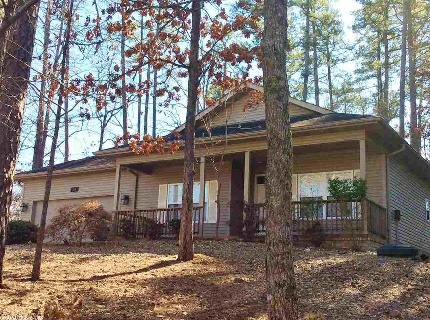 Just a short walk to the Cortez Beach! Enjoy Lake side living in this Open floor plan, freshly painted, and Nestled in the trees for Maximum appeal! Large kitchen with pantry, Level patio overlooking scenic woods! Front porch lake view! Conveniently located to the commerce center at Carmona and walking trails nearby! Move in Ready! One year home warranty offered by seller! Several photos are of the Cortez Beach and water activities available on Lake Cortez! See agent remarks.