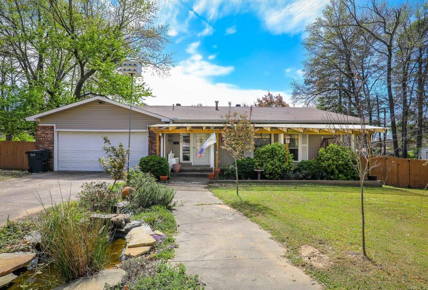 Nice home in the heart of Benton located in an established subdivision close to everything including Grocery Stores, Walmart, Library, Hospital, Public Park, Schools, Courthouse and so much more! Enjoy the covered front porch and charming small wildlife/goldfish pond by the sidewalk. Inside, you’ll find a spacious, inviting living room, and 3 roomy bedrooms.  The updated kitchen features granite countertops, surface top range, built in oven, island with breakfast bar and dining area by the large window giving plenty of natural light, all perfect for everyday living. The large Bonus/family room offers tons of possibilities such as game room, 4th bedroom, office, or hobby space. It also includes a storm shelter for added peace of mind. French doors lead out to a nice deck overlooking a large, privacy fenced backyard with trees and a storage building for extra space.  Please measure if concerns with square footage.