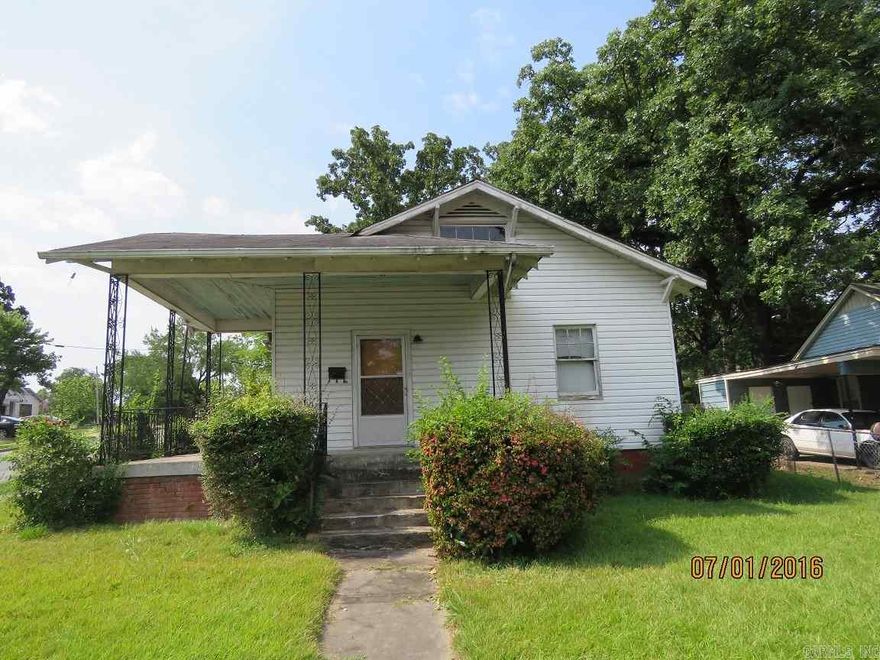This is the perfect investment property.  It needs just a little work. It is on a corner lot with a detached 1 car carport with storage. It has siding and hard wood floors. Sold As-Is.