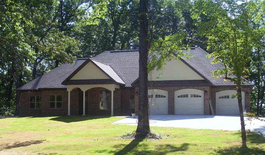 Custom built new construction with wine bar, large master shower, saferoom custom built inside of home, granite counters, covered front and back porch with second fireplace on back porch, hardwoods in foyer, study, formal dining, family room, kitchen & breakfast room.