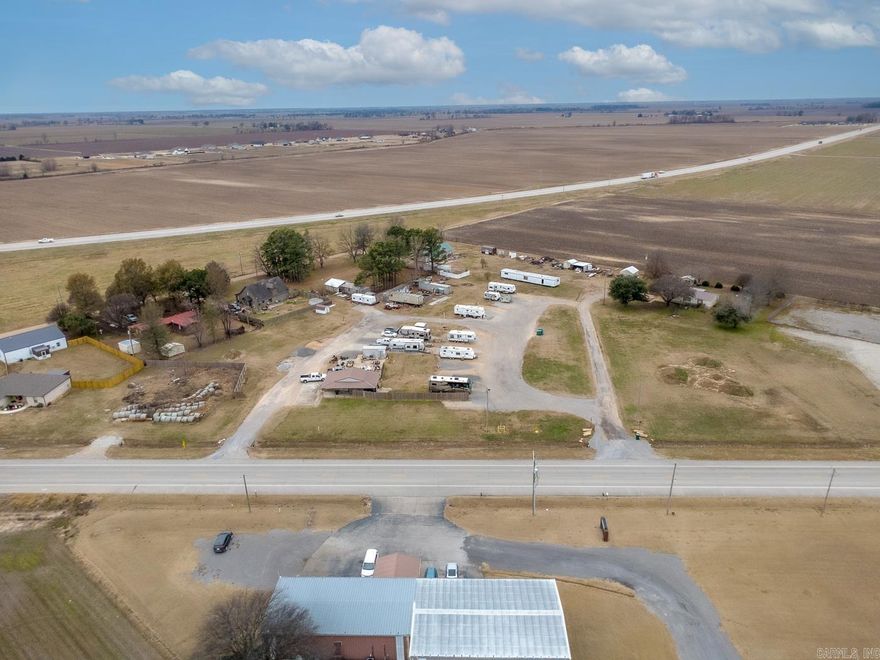Welcome to Market 2655, 2659, and 2661 Highway 18 B in Manila, Arkansas. This multi-parcel commercial investment totals approximately 3.25+/- acres and offers a strong income-producing opportunity with prime Highway 18 B frontage, delivering excellent access and visibility.  Its location near Jonesboro and Blytheville places the property within reach of major industrial and manufacturing employers, contributing to reliable demand for RV and workforce housing.  The property includes 12 established RV rental spots currently rented at $500 per month each, a 624 sq ft one-bedroom, one-bath efficiency apartment renting for $800 per month, and three storage trailers. Based on current rents, the property generates an estimated gross annual income of approximately $81,600.  Schedule your showing today to learn more about this versatile investment.