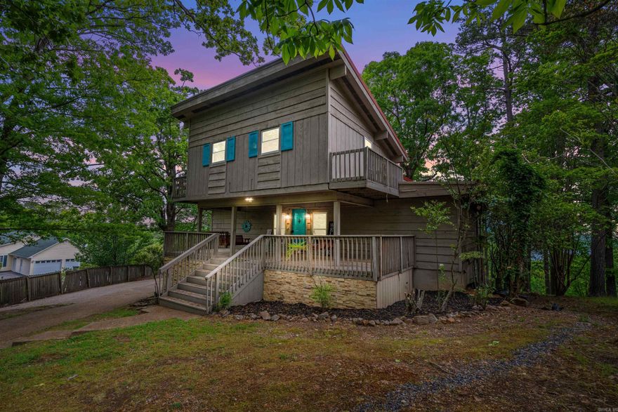Wake up to stunning water views and a lush, private landscape in this spacious 5-bedroom, 4-bathroom home. With soaring vaulted ceilings and expansive windows, the interior is bright, open, and built for both comfort and entertaining. This beautiful home is adorned with updates including bathroom vanities and tile, wood floors upstairs, light fixtures, front porch swings, and more. Unwind in the brand-new hot tub while soaking in panoramic views of the lake and mountains. Whether you're hosting or relaxing, the outdoor setting is unbeatable. Enjoy top-tier amenities including access to a golf course, lake, community pool, and playground—everything you need for resort-style living. This home offers the perfect blend of peace, space, and recreation.