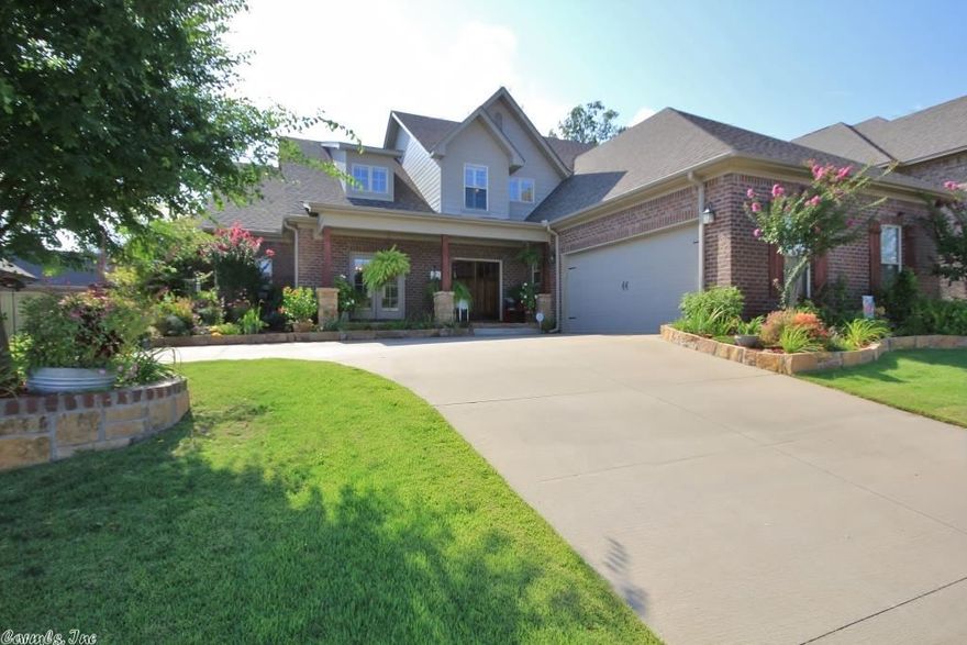 One of the BEST flrplans you'll find! 2 BR's main lvl, 2 BR's & loft play area up, gorgeous landscaping frnt & bck, hand scraped hdwd floors in a huge open dining/kitchen/greatroom area w/ high tray ceiling, recessed lighting and amazing stone fireplace! Beautiful plantation shutters throughout. Large gourmet kit is perfect in every way w/ stunning granite & stainless steel appliances. Butlers pantry, mud room, laundry room, 2 car side load garage, security, sprinkler and tons of attic storage! This is it!!