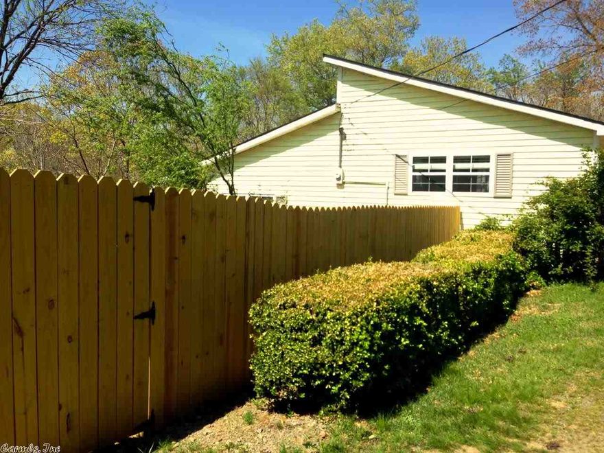 Beautiful split-level home on a quiet road with a nice shop and small greenhouse on 2.36 acres.  The back deck overlooks the Cadron Creek, and inside, hardwood floors, a large kitchen, and nice dining room make the home a great find in the area.  Bathroom was recently remodeled and the side yard was just fenced. This would be a great place to grill on the back deck and watch the wildlife.  Although address is Damascus, home is in the Quitman school district.  Bus stop is very close if you have young ones.