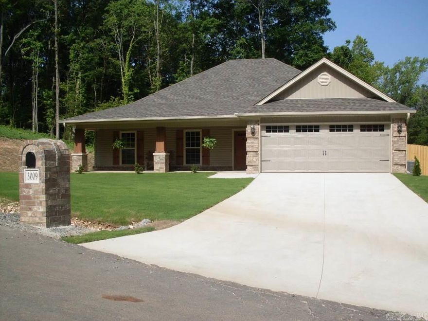 Great location in Benton School District.  New construction home in Mulberry Ridge Subdivision on almost one acre lot. 1861 s.f. and features large front porch with craftsman post.  Split, open floor plan with corner fireplace in living area and beautiful master bath.  Large deck on back with privacy fence. Seller is adding 12 X 20 shop,