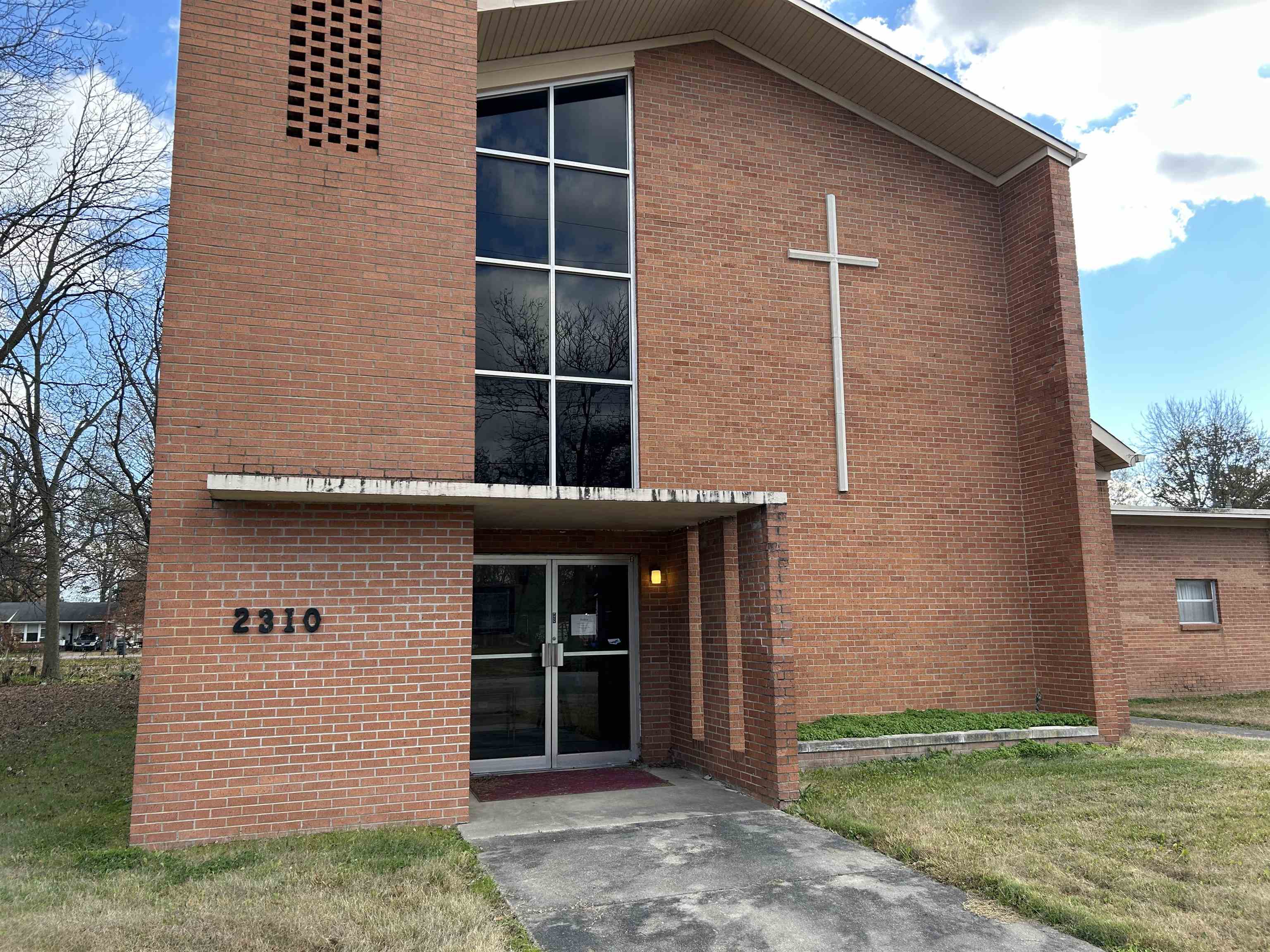 Church building in the Nettleton District, one block north of the Nettleton High School Campus. Very revered sanctuary with a beautiful altar, stained glass windows and media room for support in the church services. The building has a church office, fellowship hall complete with kitchen, three Sunday school rooms, music room, nursery, two rest rooms and a large storage room which includes a shower. The corner marker shows the original building was built in 1894. The new building is shown to have been dedicated in 1956 with sanctuary renovation in 1985.