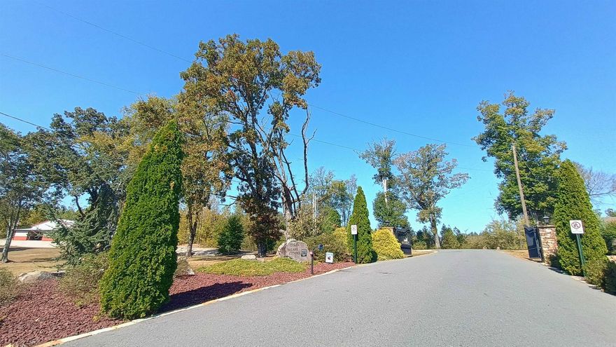 Beautiful gated subdivision with amazing views of the private lake and mountains.  Many lots to choose from.  Minimum of 1350 sqft.