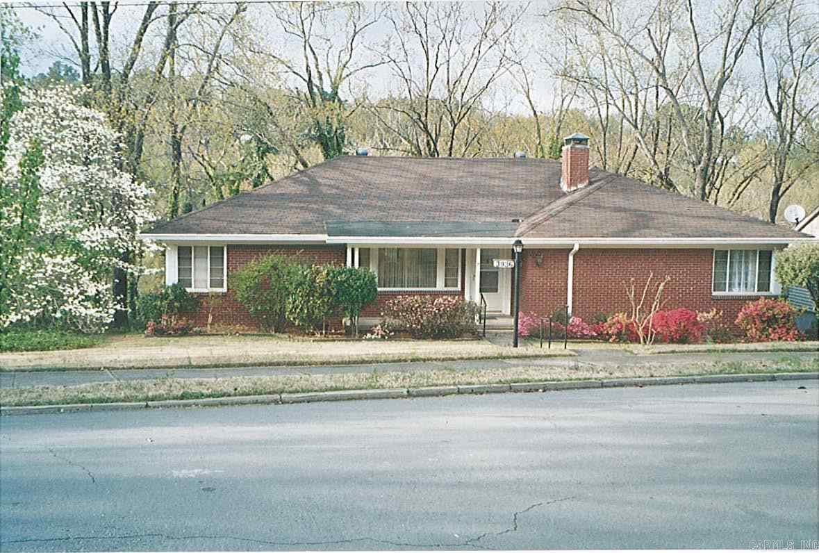 Charming brick 4/5 bedroom home with open floorplan and lots of light. Big windows! Live all on one level or overflow to one upstairs bedroom. Basement offers 2 car garage, workshop and storage space. Lots of storage and beautiful yard! Great family home!! Well maintained! Architectural shingle roof in December 2007. HVAC in August of 2012 . You will love the porches and spaciousness of this home! Please give as much notice as possible!