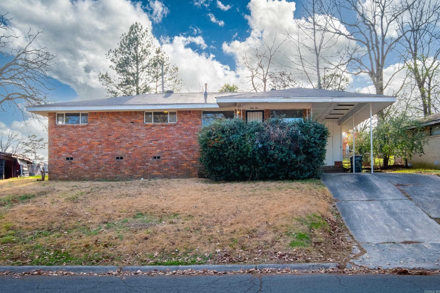 One-story brick home offering 3 bedrooms and 2 full baths with tons of updates and potential! Freshly painted interior and beautiful newer LVP flooring that flows throughout the home. The spacious, open living and dining area is filled with natural light—perfect for entertaining or relaxing. The kitchen offers ample storage and connects seamlessly to the main living space. Enjoy peace of mind with major updates including a roof replaced in 2019/2020 and a brand new water heater (2025). Outside, you’ll find an extra parking pad alongside the one-car carport, backyard with deck and space for gardening or outdoor gatherings. Conveniently located near schools, parks, and shopping, this home is ideal for first-time buyers or investors looking for a solid property with modern touches already completed!