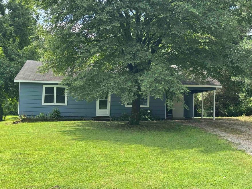 Are you longing for country living with all the benefits of town? This home has it. With a 1.14 acre lot you will have room for pets, kids, a pool, a shop or all of the above! New carpet has been installed in the bedrooms as well as a fresh coat of paint so it is move in ready!