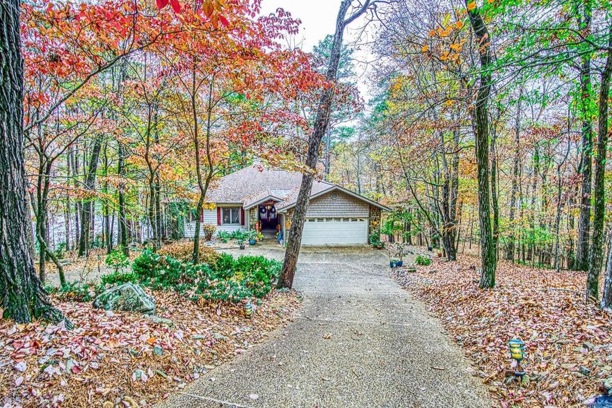 The first thing you see about this lakefront estate is the long, stately, circular driveway and it just gets better.  This beautiful home sitting on over an acre of land and with 226 feet frontage of the most picturesque lake in the Village, Lake Cortez, has everything one could hope for including a gourmet kitchen, amazing sunrise and sunset views and a second living space with brand new flooring and a full kitchen.  Yes, that is correct, two living spaces with two stone fireplaces (gas logs) which can warm the house on cool winter days, new wrap around decking, screened porches and a covered, cut-in double boat dock with an electric lift. The downstairs living area even has an internal atrium.  The lot boasts mature, low maintenance, landscaping because we know you have better things to do than mow the lawn, and the abundance of wildlife in the area (including bald eagles) which are an absolute delight to watch.  This house is a perfect reward home for a large family; a couple with a mother-in law or just someone with discerning taste who has lived a live deserving of this little corner of luxury.